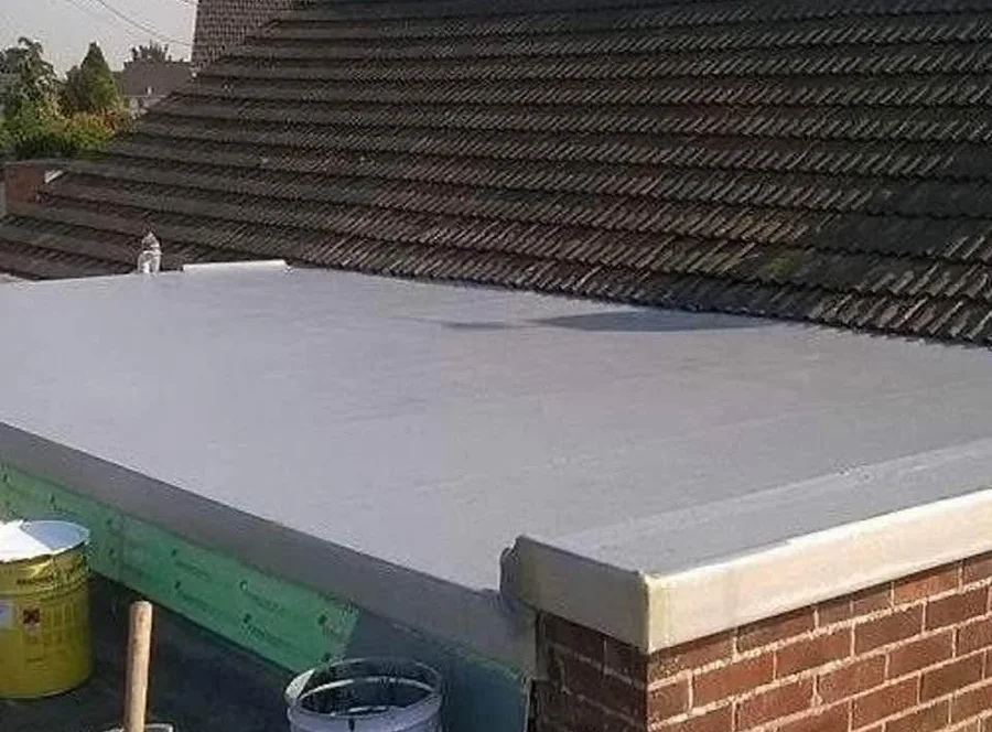GRP fibreglass roof finished to a brick parapet wall